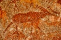 Bushmen rock painting of human figures and antelopes, giraffe of the Matopos National Park, Zimbabwe Royalty Free Stock Photo