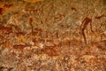 Bushmen rock painting of human figures and antelopes, giraffe of the Matopos National Park, Zimbabwe