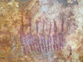 Bushmen san rock painting of humans and antelopes, Drakensber Royalty Free Stock Photo