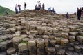 Bushmills, Northern Ireland: people on the columns of the Giant`s Causeway