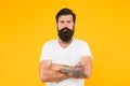 Bushy beard hipster man barbershop client yellow background, facial hair cosmetics concept