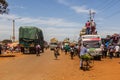 BUSIA, KENYA - FEBRUARY 24, 2020: Various vehicles on the main road to Uganda border crossing in Busia, Ken