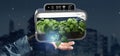 Businesmann holding a Digital vegetal plant connected Royalty Free Stock Photo
