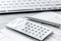 Business accounter work with taxes and calculator on white office desk Royalty Free Stock Photo