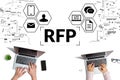 Business acronym RFP or Request For Proposals. Persons work on computers