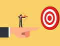 Business advantage or efficiency. businessman Stand and holding a bow on the giant hand pointing to the target, business direction