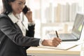 Business African American Woman Working sitting at her Desk Royalty Free Stock Photo