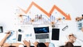 Business Analysis Concept with Team Collaboration and Data Visualization, Focus on Financial Trends and Graphs Royalty Free Stock Photo