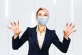 Business angry girl cry wearing protective face mask prevent virus infection, pollution