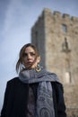 Business angry woman in front of a tower