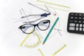 Business Architectural project, pair of compasses, glasses, rulers and calculator Royalty Free Stock Photo