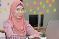 Business asian muslim woman happy working job on laptop in office Royalty Free Stock Photo