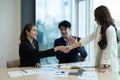 Business asian people shaking hands, finishing up meeting, business etiquette, congratulation, merger and acquisition Royalty Free Stock Photo