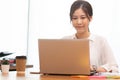 Business asian woman happy working job on laptop in office Royalty Free Stock Photo