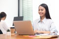 Business asian woman happy working job on laptop in office Royalty Free Stock Photo