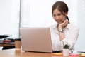 Business asian woman happy working job on laptop in office Royalty Free Stock Photo