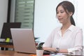 Business asian woman happy working job on laptop in office Royalty Free Stock Photo