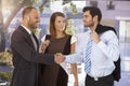 Business associates shaking hands on the street Royalty Free Stock Photo