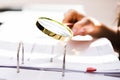 Business Auditor Using Magnifying Glass Royalty Free Stock Photo