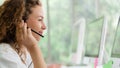 Business background of caucasian female call center agent on service with call from customer at customers relation and helpdesk Royalty Free Stock Photo