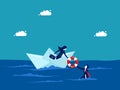 Business bankruptcy assistance concept. businessman on a paper boat and rescues a drowning man