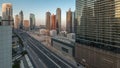 Business bay district skyline with modern architecture night to day timelapse from above. Royalty Free Stock Photo