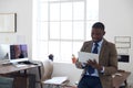 Business, black man and tablet in office for planning, connection and internet research in agency. Happy male worker