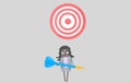 Business black woman holding a big blue dart. Dartboard. Isolated.