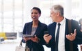 Business black woman and man talking, walking and in office for planning together. Coworkers, female manager and male Royalty Free Stock Photo