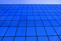 Business Building with Glass Windows Reflecting Blue Sky Royalty Free Stock Photo