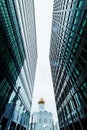 Business buildings skyline looking up with sky and churche, high-rise buildings, modern architecture