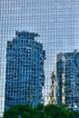 Skyscrapers of Toronto, Canada reflected in glass building