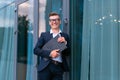 Business. Businessman Glasses Standing City Street Near Office Building