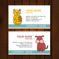 Business card with cat and dog for veterinary clinics on wooden