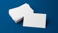 Business card mockup resting on a stack of cards. Branding design concept. Insert design Royalty Free Stock Photo