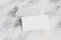 Business cards on marble surface. 3d illustraton