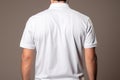 Business casual mens white polo shirt from behind, exuding relaxed professional elegance