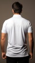Business casual mens white polo shirt from behind, exuding relaxed professional elegance