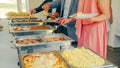 Business catering people take buffet food during company event Royalty Free Stock Photo