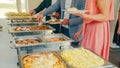 Business catering people take buffet food during company event Royalty Free Stock Photo