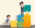 Business characters in team activity vector concept. Male business team of employees in building puzzle activity. Royalty Free Stock Photo