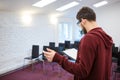 Business coach reading his speech in empty meeting room. Backside Royalty Free Stock Photo