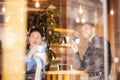 Business colleagues having a coffee at a cafe bar Royalty Free Stock Photo