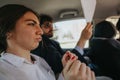 Business colleagues in a car going over documents together Royalty Free Stock Photo