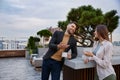 Business colleagues chitchatting during coffee break at office roof Royalty Free Stock Photo