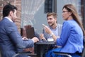 Business colleagues discussing business issues at the coffee table Royalty Free Stock Photo