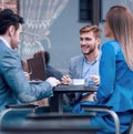 Business colleagues discussing business issues at the coffee table Royalty Free Stock Photo