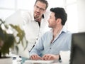 Business colleagues discussing business issues near the desktop Royalty Free Stock Photo
