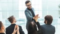 Business colleagues giving each other a high five Royalty Free Stock Photo