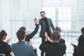 business colleagues giving each other a high five Royalty Free Stock Photo